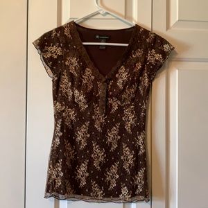 Inc top. Lace overlay. In excellent condition